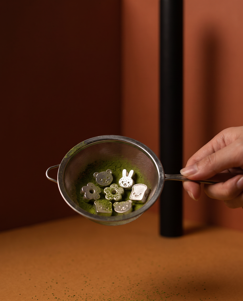 Lumi matcha set — beads in the sieve
